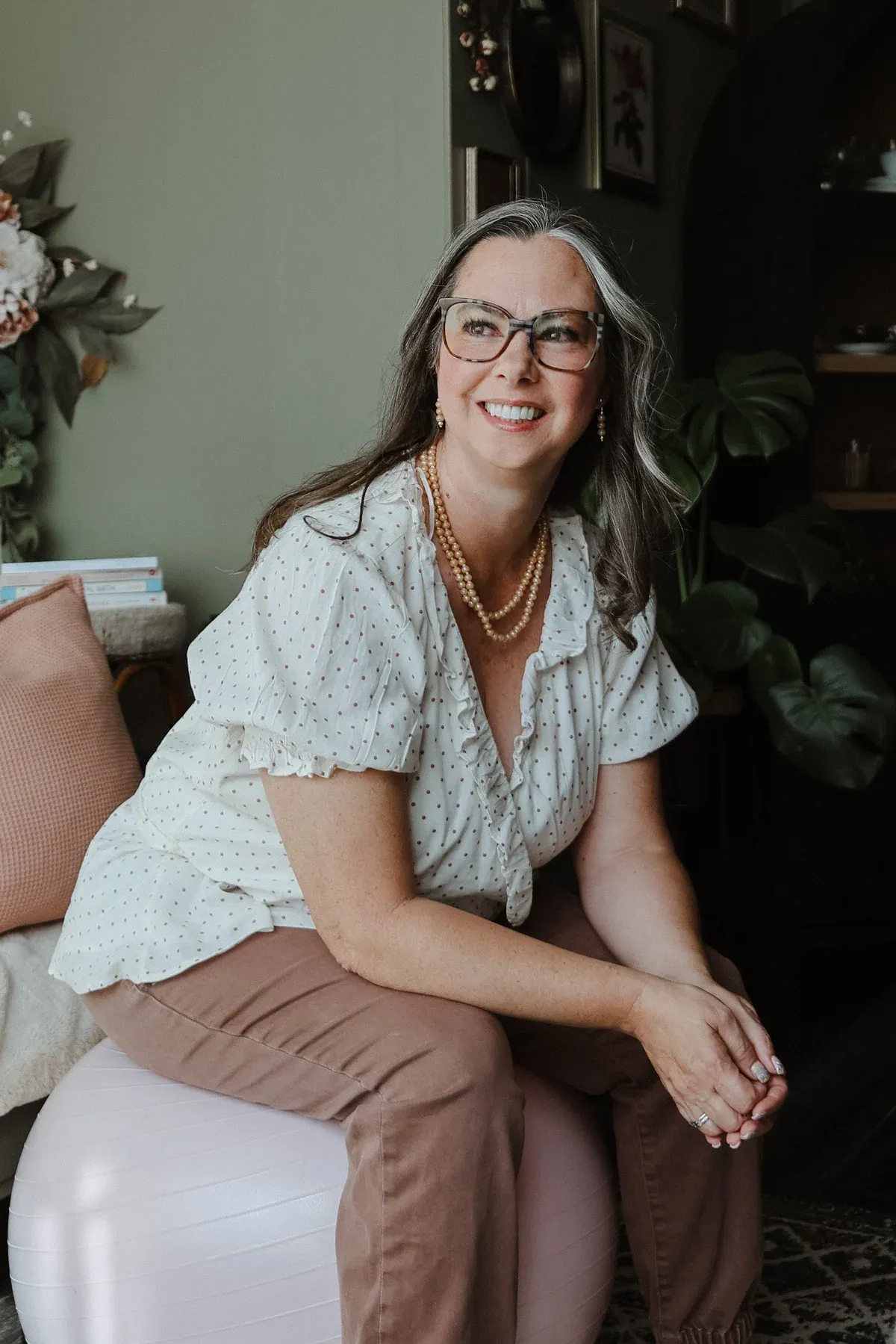 Kristi Fulton, doula, smiling indoors